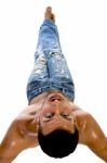 Male Lying Down And Looking Backwards Stock Photo