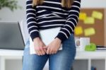 Confident Young Woman Working In Her Office With Digital Tablet Stock Photo