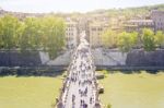 Saint Angel Bridge Over The River Tiber With Tourists Stock Photo