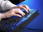 Woman Hand Typing On Keyboard Stock Photo