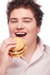 Smiled Chubby And Hamburger Stock Photo