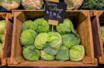 Fresh Cabbage Vegetable In Wooden Box Stall In Greengrocery With Price Chalkboard Label Stock Photo