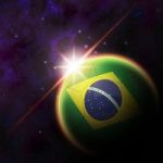 Brazil Flag On 3d Football With Rising Sun Stock Photo