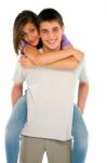 Smiling Boy Piggybacking Girl Stock Photo