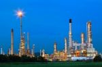 Beautiful Lighting Of Oil Refinery Palnt Against Dusky Blue Sky Stock Photo