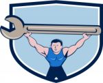 Mechanic Lifting Giant Spanner Wrench Crest Cartoon Stock Photo