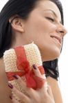 Close Up Of Woman Scrubbing Her Neck Stock Photo