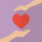 Hands Holding Heart Icon Stock Photo