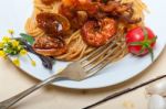 Italian Seafood Spaghetti Pasta On Red Tomato Sauce Stock Photo