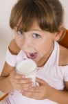 Girl Going To Drink Milk Stock Photo