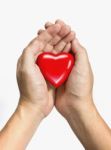 Red Heart In Hands Stock Photo