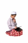 Muslim Boy Eating Stock Photo