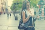 Young Business Woman With Tablet Computer Walking On Urban Stree Stock Photo