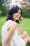 Young Woman With A Crown Of Flowers Stock Photo