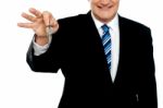 Cropped Image Of Businessman Holding Keys Stock Photo