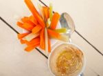 Fresh Hummus Dip With Raw Carrot And Celery Stock Photo