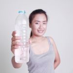 Woman With Water Bottle Stock Photo