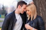 Young Couple In Park Stock Photo