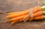 Baby Carrots Bunch Tied With Rope Stock Photo