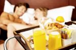 Couples lying on bed Stock Photo