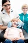 Child On Her Dental Check Up Stock Photo