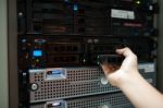 Man Fix Server Network In Data Center Room Stock Photo