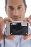 Young Caucasian Man With Camera Stock Photo