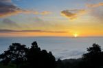 Colorful Sunrise Above The Clouds Stock Photo