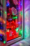 Bright Colored Electric Garland In The Window Stock Photo