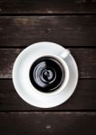 White Coffee Cup On Vintage Dark Wood Floor Stock Photo