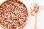 Organic Dry Multi Grain Rice In Wooden Bowl Stock Photo