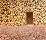 Stone Wall With Door And Stone Floor In Front Off Stock Photo