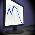 Arrow Falling On Monitors Showing Bad Statistics Stock Photo