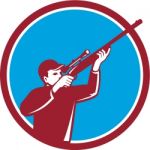 Hunter Shooting Up Rifle Circle Retro Stock Photo