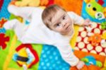 Infant Boy On Playmat Stock Photo