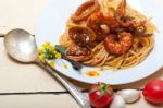 Italian Seafood Spaghetti Pasta On Red Tomato Sauce Stock Photo