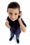 Boy Talking Phone With Thumb Up Stock Photo