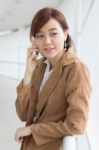 Portrait Of Thai Adult Businesswoman Beautiful Girl Calling Smart Phone Stock Photo