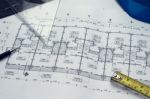 Architectural Blueprints And Blueprint Rolls And A Drawing Instr Stock Photo