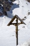 Sculpture Of Jesus On The Cross At Pordoi Stock Photo