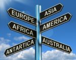 Europe Asia America Signpost Stock Photo