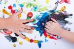 Closeup Of Little Children Hands Doing Finger Painting With Vari Stock Photo