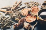 Dried Herbs And Ginseng, Top View Of Thai Herbs And Ginseng On Wooden Floor Stock Photo