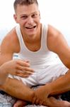 Portrait Of Smiling Man In Bed Stock Photo