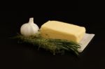 Butter Herb Thyme Rosemary Garlic  Black Background Stock Photo