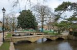 Tourists Wandering Around Bourton-on-the-water Stock Photo