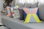 Colorful Pillows On Modern Grey Sofa In Living Room Stock Photo