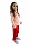 Child Standing With Hand In Pocket Stock Photo