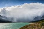 Storm Clouds Gathering Over Lake Sherburne Stock Photo