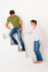 Couple Climbing Stairs Stock Photo